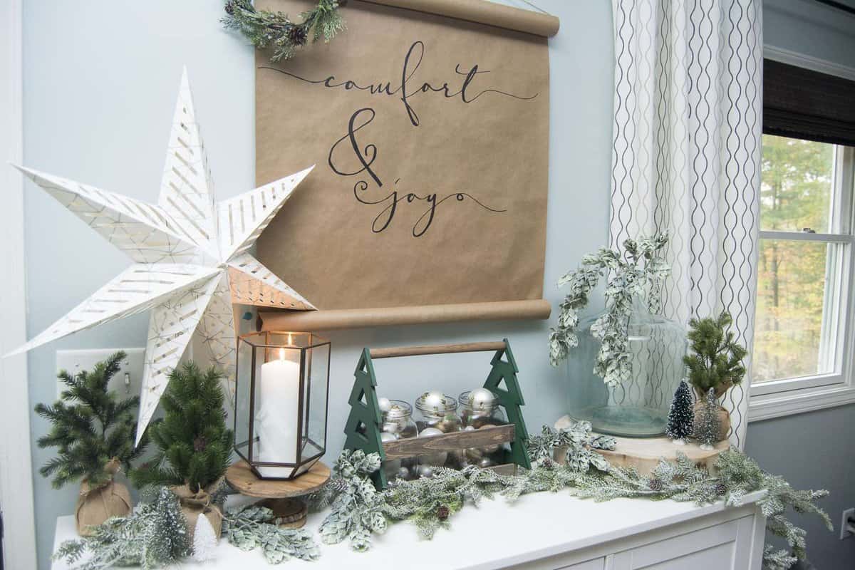 If you're looking for simple and affordable Christmas decor, look no further than this easy DIY Christmas scroll art! This project takes less than 1 hour!