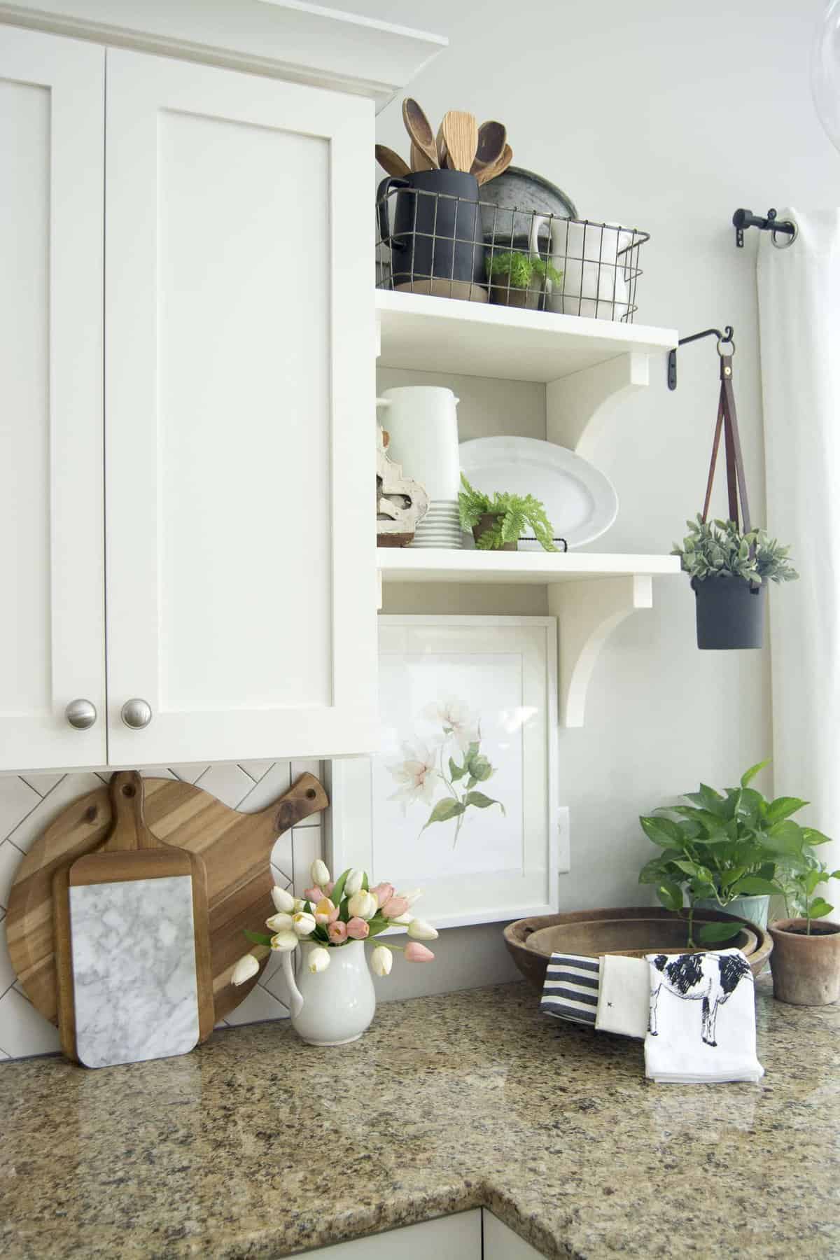 Are you looking for pretty and practical spring kitchen decor ideas? Here are some sure fire ways to beautify your spring kitchen decor and bring some sunshine and life back into your kitchen. This is perfect for the modern farmhouse kitchen lover who enjoys a bit of character in her home.