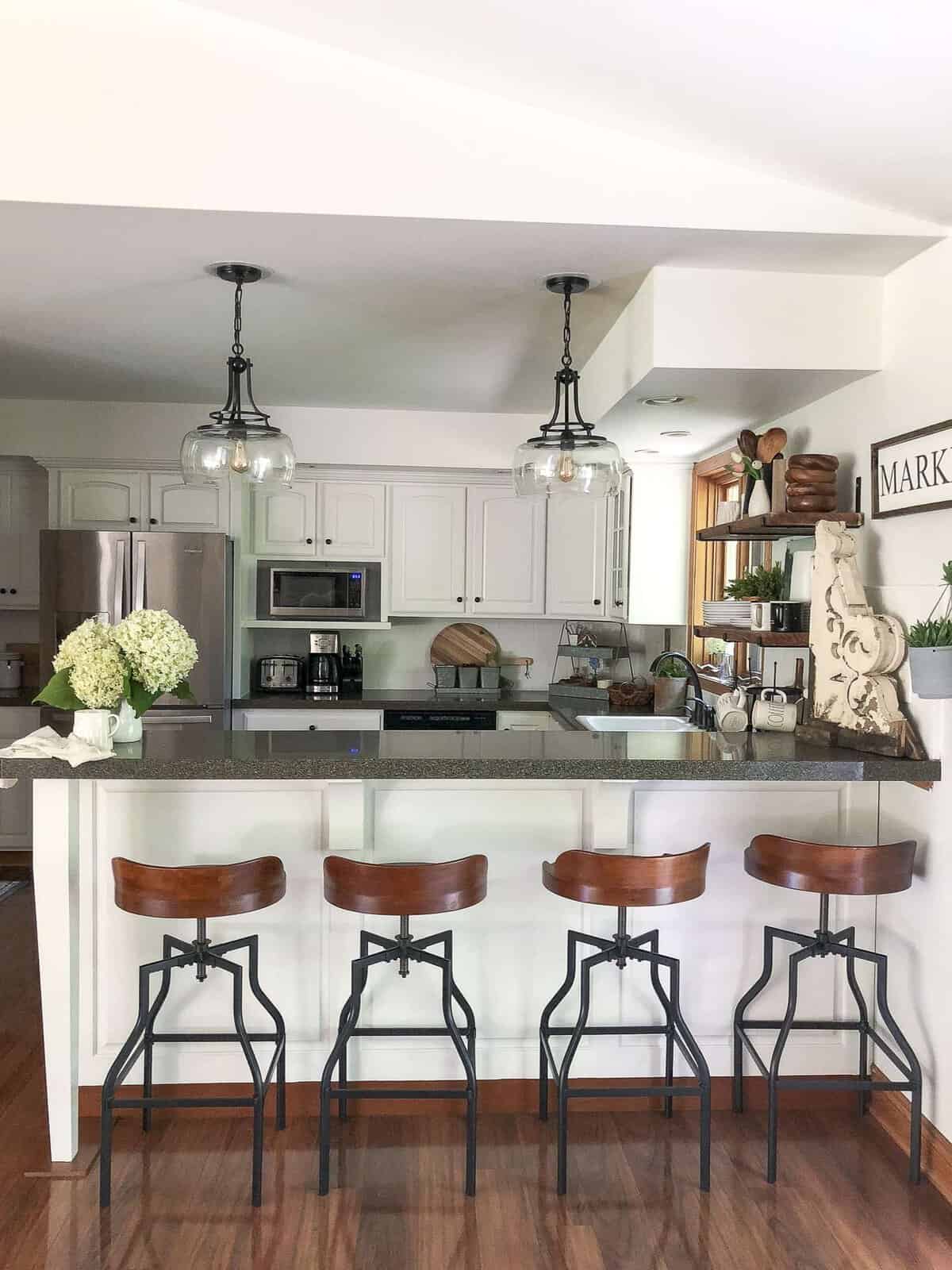 Kitchen Remodel on a Budget | The final reveal of our budget friendly kitchen remodel along with a DIY pendant makeover and beautiful kitchen decor ideas.