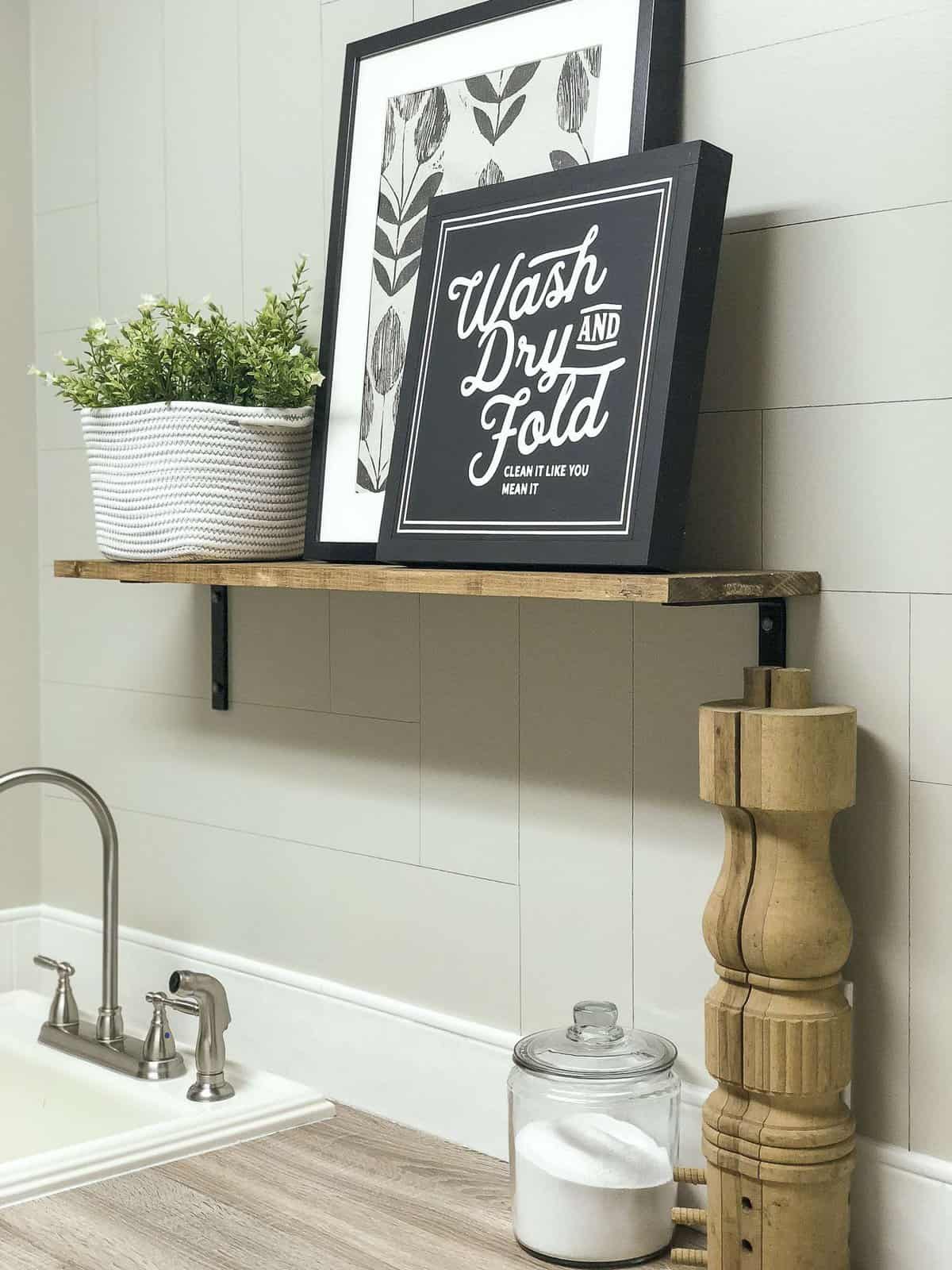 Is your laundry room in need of a facelift? See how I take my laundry room decor and more from dark and dated to beautiful form and function, all for $100!