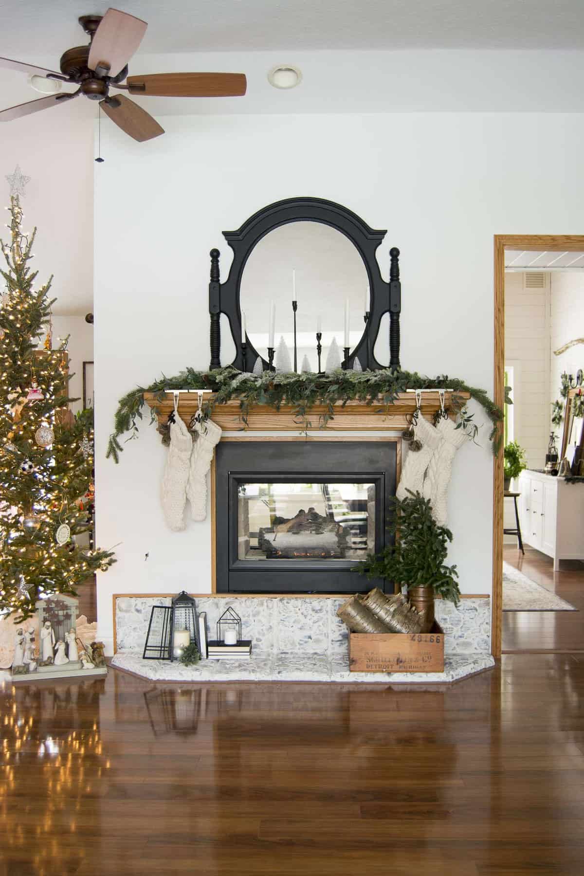 Do you struggle to decorate your mantel for Christmas? Today I'm sharing easy tips for how to decorate your Christmas mantel in 5 easy steps. #christmasmantel #manteldecorations #fromhousetohaven