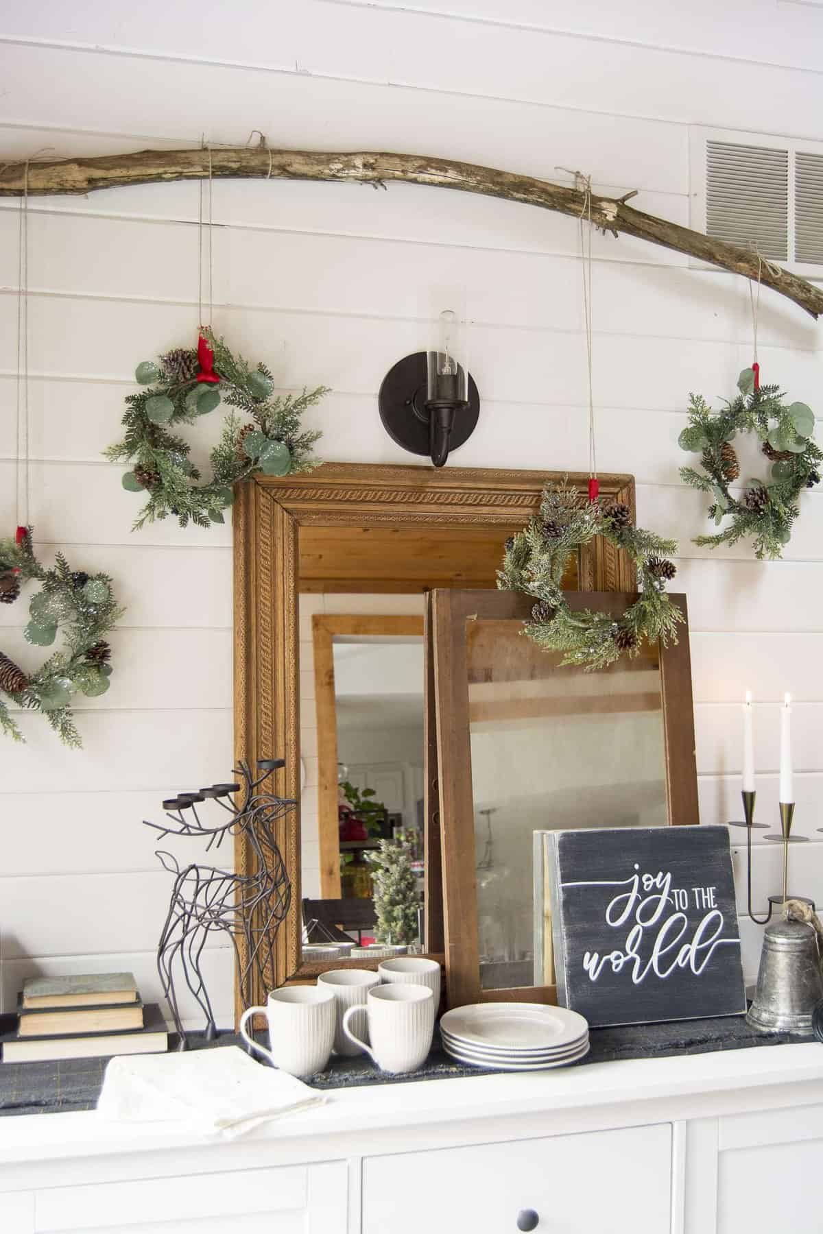 Vintage Christmas decorations are a beautiful addition to your Christmas decor. See how I styled my vintage decor alongside a DIY wreath wall! #vintagechristmasdecorations #christmasdecor #christmaswreath