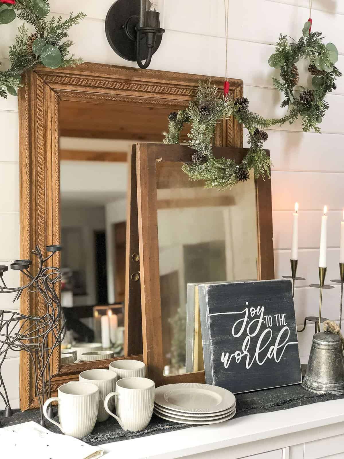 Are you planning a holiday get together? No need to buy Christmas dishes! Here are a few tips on how to use everyday dishes for your holiday table decor. #holidaytabledecor #christmasdecor
