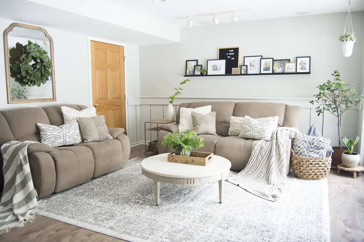 Do you struggle to keep your family room pretty and practical? Today I'm sharing my family room design and how I make it work for an active family of four. #fromhousetohaven #familyroomdesign #livingroom #homedecor