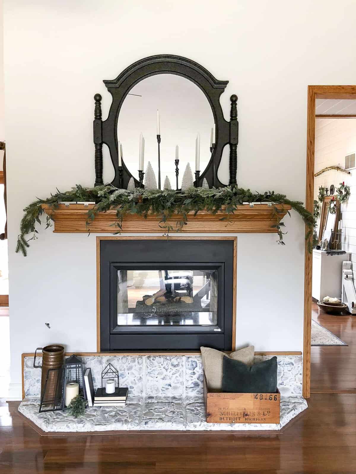 Are you looking for an easy way to update a river rock hearth? Try the german schmear technique to transform outdated rock to beautiful European country style. #germanschmear #fireplace #diyfireplace