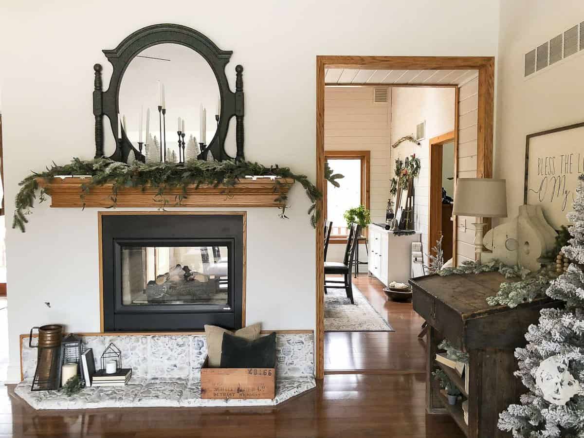 Are you looking for an easy way to update a river rock hearth? Try the german schmear technique to transform outdated rock to beautiful European country style. #germanschmear #fireplace #diyfireplace