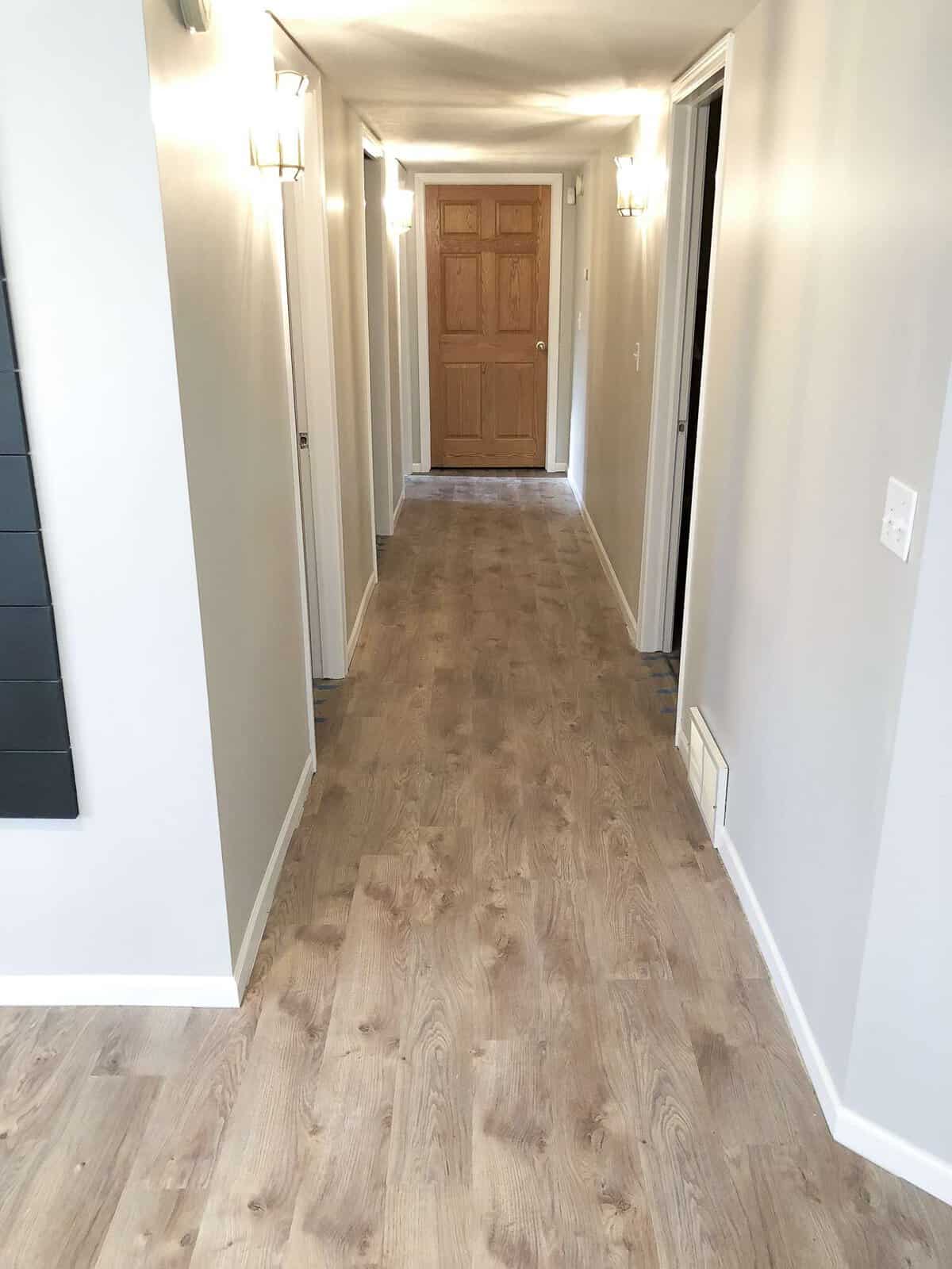 Looking for beautiful basement flooring that will stand up to water, pets and kids? Here is a modern farmhouse basement makeover with flooring made to last. #modernfarmhouse #basementflooring #basementremodel #fromhousetohaven