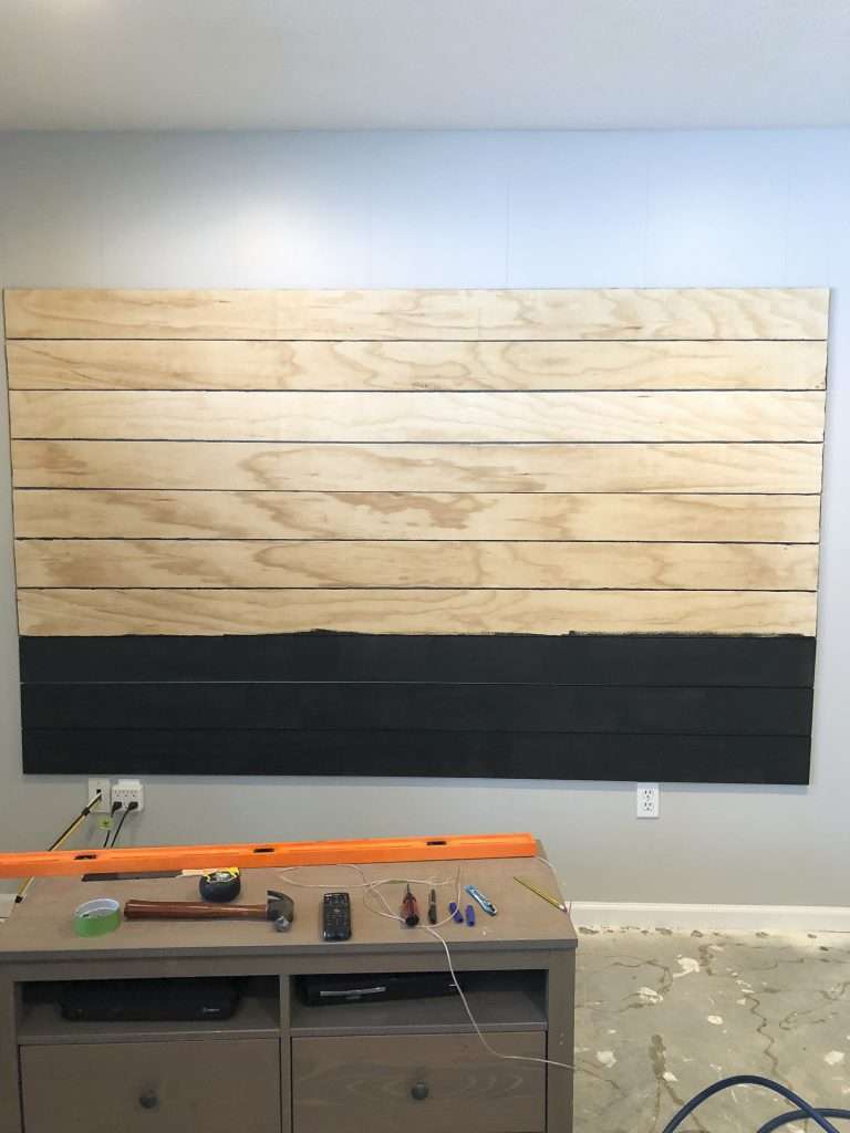 This DIY tutorial gives you the basic steps to create a shiplap accent wall! Complete this easy accent wall in one day for an easy way to heighten design. #fauxshiplap #shiplapaccent #fromhousetohaven