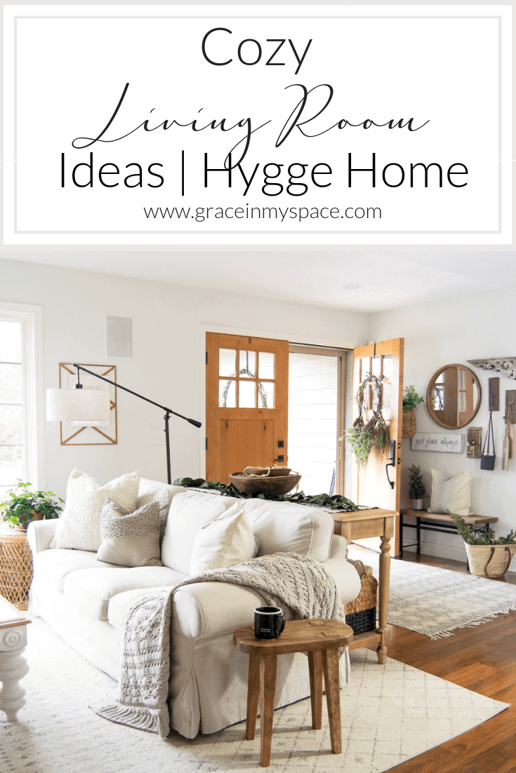 The hygge movement of intentional coziness is in full swing! On the blog I'm sharing cozy living room ideas that you can incorporate on a budget!  #fromhousetohaven #cozylivingroom #livingroomideas #hyggehome