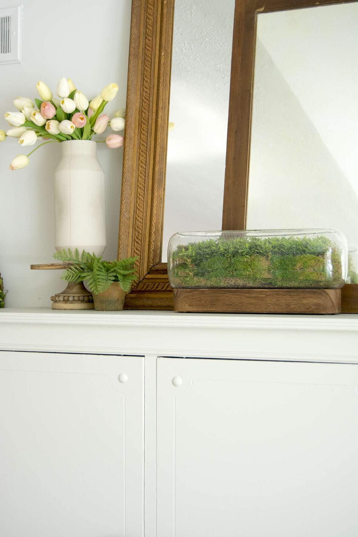 Do you love the look of terrariums? Try out this simple DIY faux terrarium! Brighten your home in less than 10 minutes with this easy tutorial. #fromhousetohaven #diyterrarium #fauxterrarium #plants
