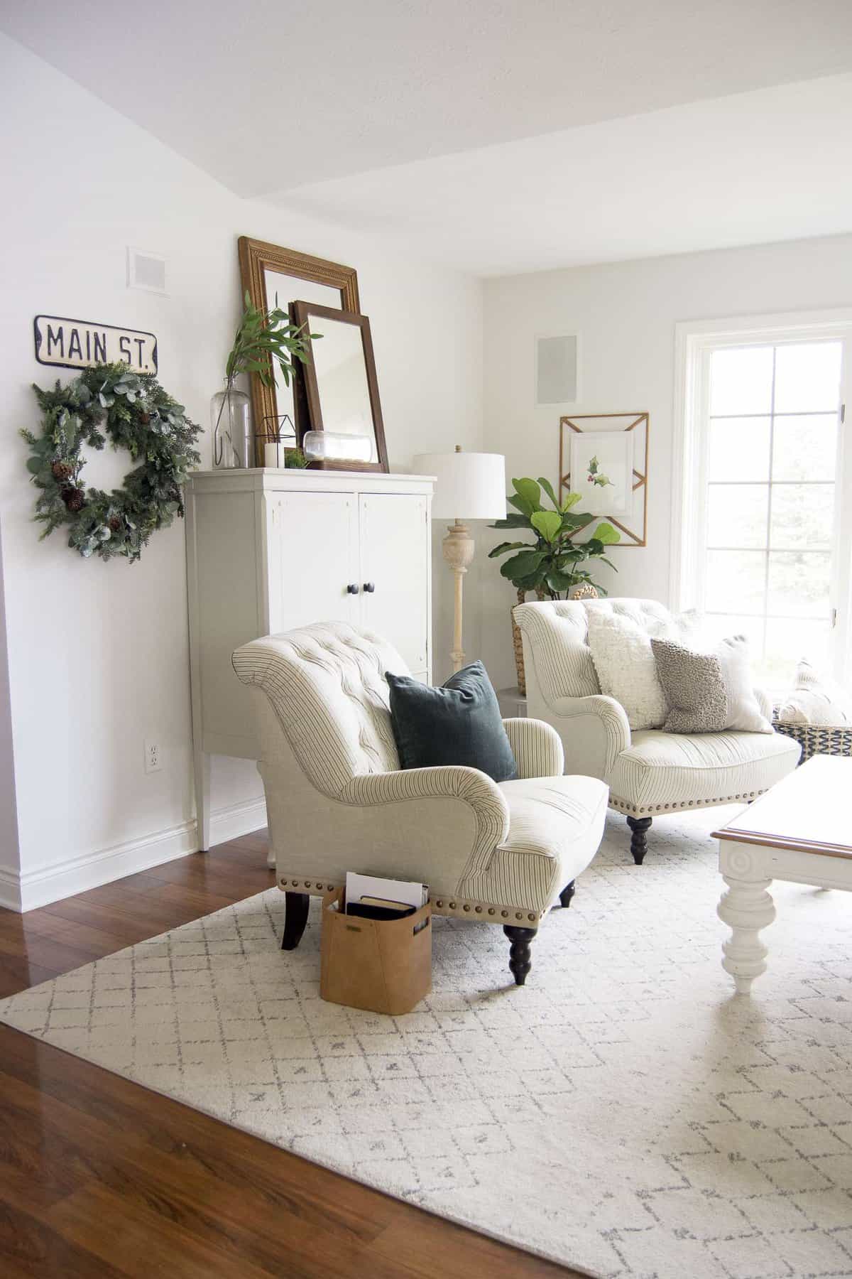 The hygge movement of intentional coziness is in full swing! On the blog I'm sharing cozy living room ideas that you can incorporate on a budget!  #fromhousetohaven #cozylivingroom #livingroomideas #hyggehome