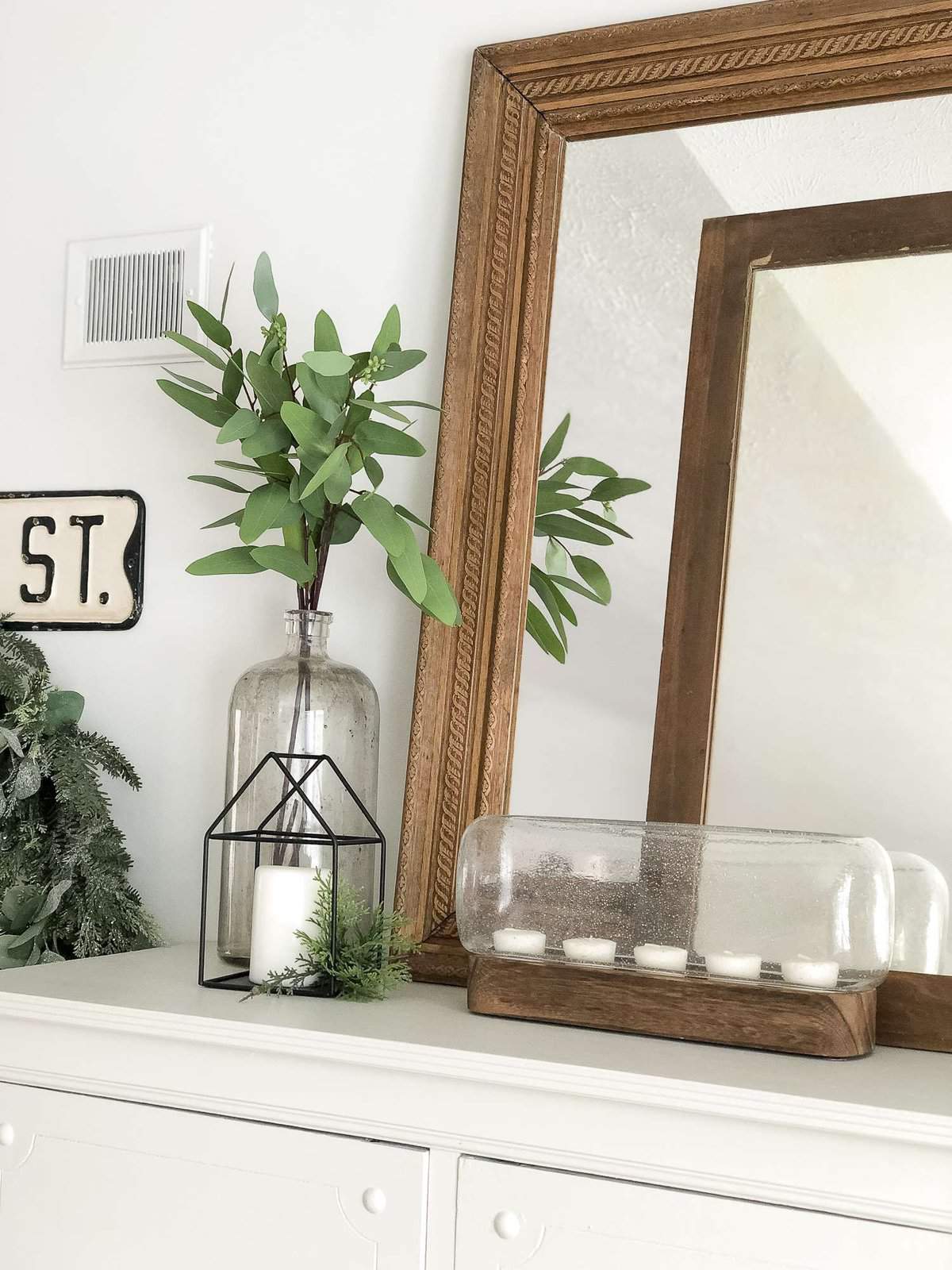 Do you love the look of terrariums? Try out this simple DIY faux terrarium! Brighten your home in less than 10 minutes with this easy tutorial. #fromhousetohaven #diyterrarium #fauxterrarium #plants
