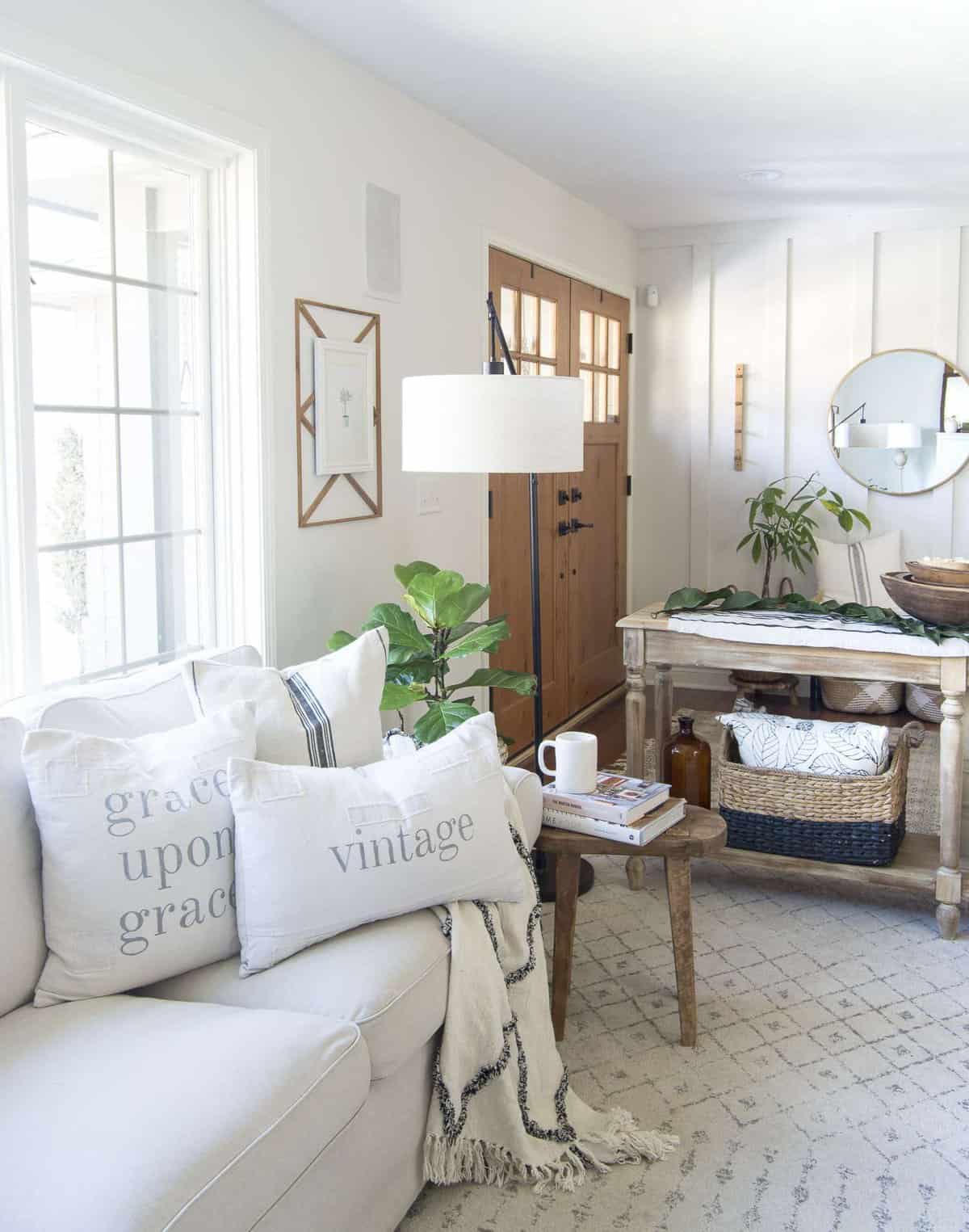 Do you need a change of pace but don't want to buy new? Change up your layout! Today I'm sharing two ways to style farmhouse living room furniture! #fromhousetohaven #livingroomfurniture #livingroomdesign #coffeetable