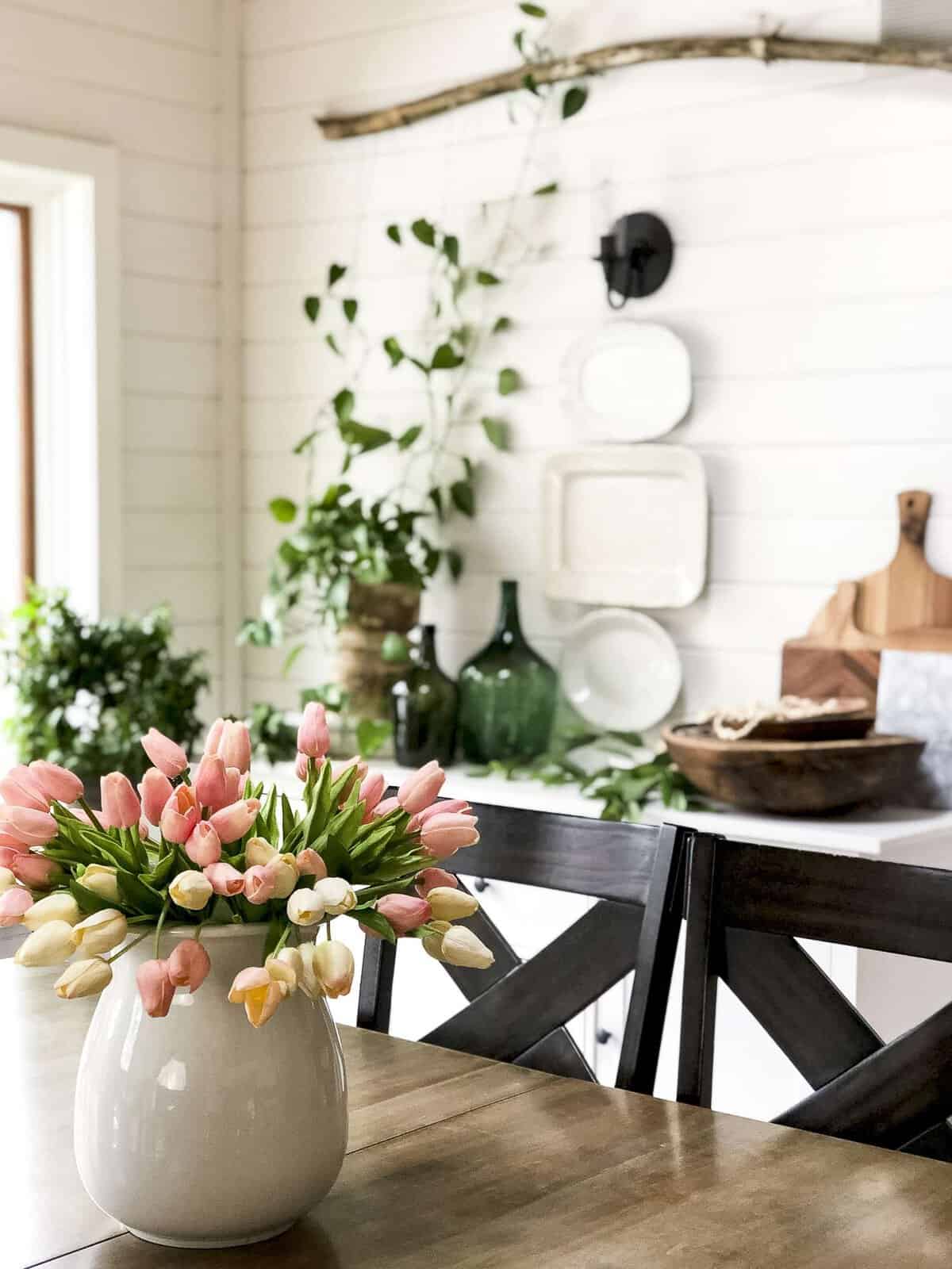 Do you have an eclectic design style? Today I'm sharing how I take my spring vintage farmhouse decor and modernize it with a hint of boho! #fromhousetohaven #springvintagefarmhousedecor #vintagefarmhouse #bohofarmhouse
