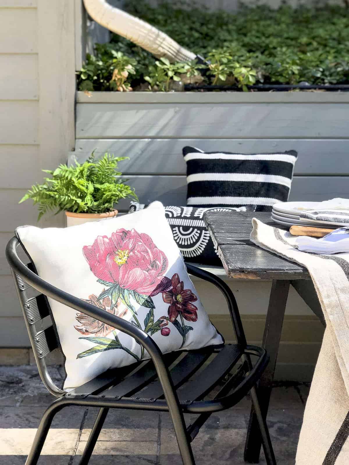 Do you love outdoor entertaining? Today I'm sharing simple ways to style your back patio with durable furniture and effortless decor for easy entertaining. #fromhousetohaven #patiodecor #outdoordining #backpatio