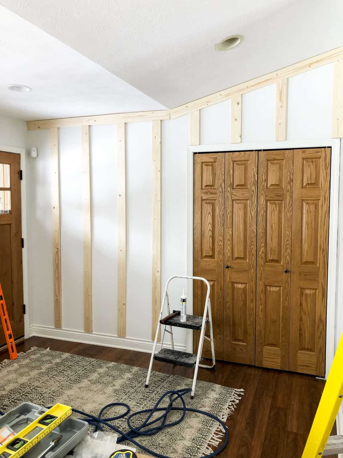 Board and batten is an easy and affordable way to create a custom look! Here is a full tutorial for how to install board and batten as an accent wall! #fromhousetohaven #boardandbatten #accentwall