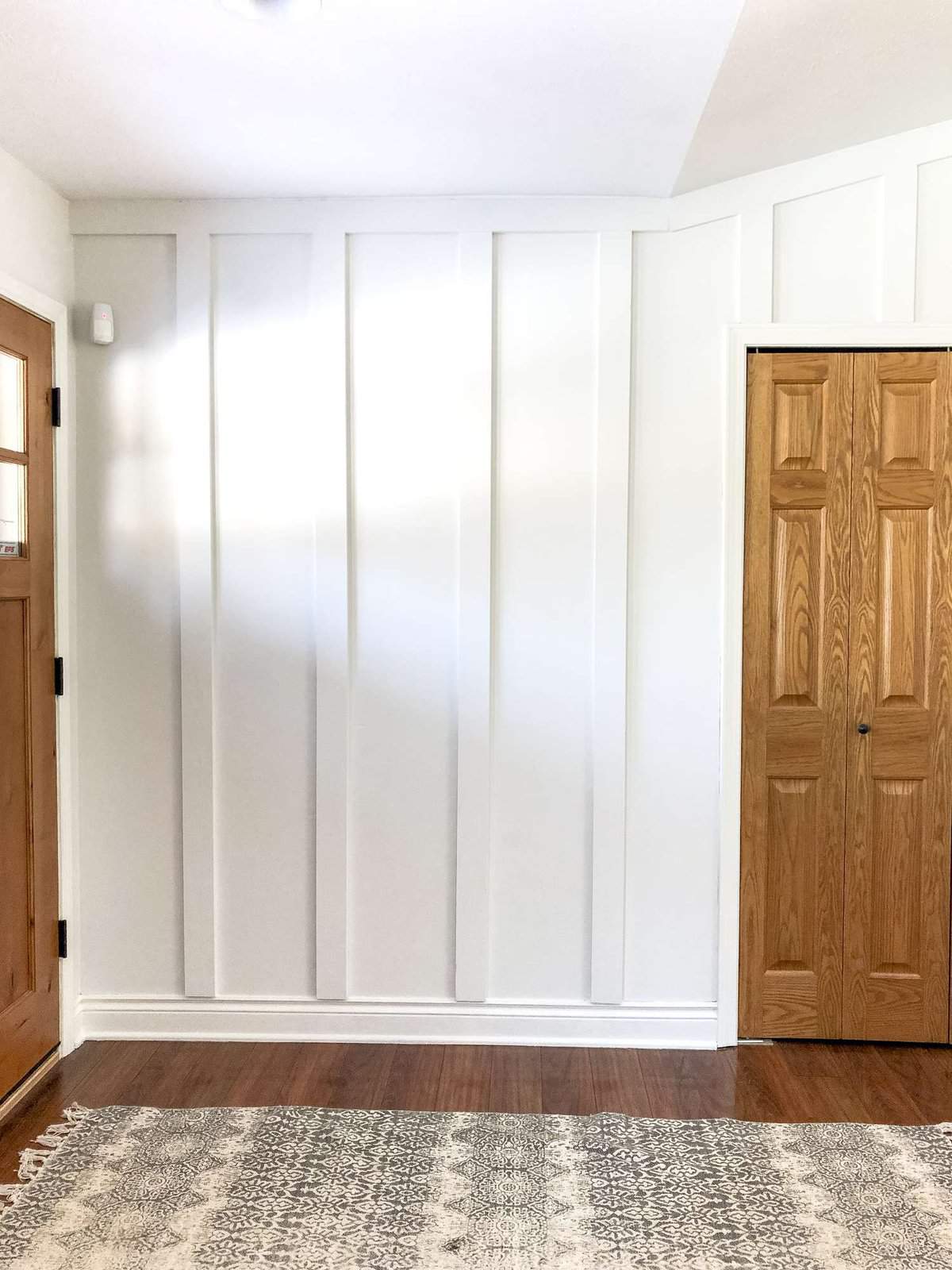 Board and batten is an easy and affordable way to create a custom look! Here is a full tutorial for how to install board and batten as an accent wall! #fromhousetohaven #boardandbatten #accentwall