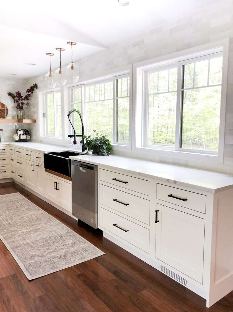 Large picture window in a modern farmhouse kitchen.