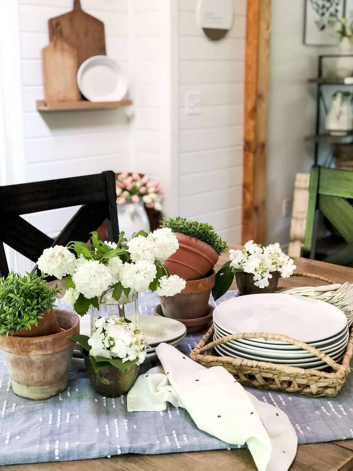 Are you looking for a themed summer tablescape idea? Here is a simple garden party summer tablescape that is effortless and beautiful. #fromhousetohaven #summerdecor #summertablescape #gardenparty