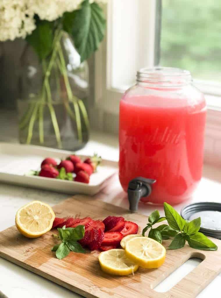 Are you looking for an extremely simple, yet refreshing, beverage for your next party? Whip up this strawberry basil lemonade in minutes! Full recipe here. #fromhousetohaven #drinkrecipe #strawberrylemonade