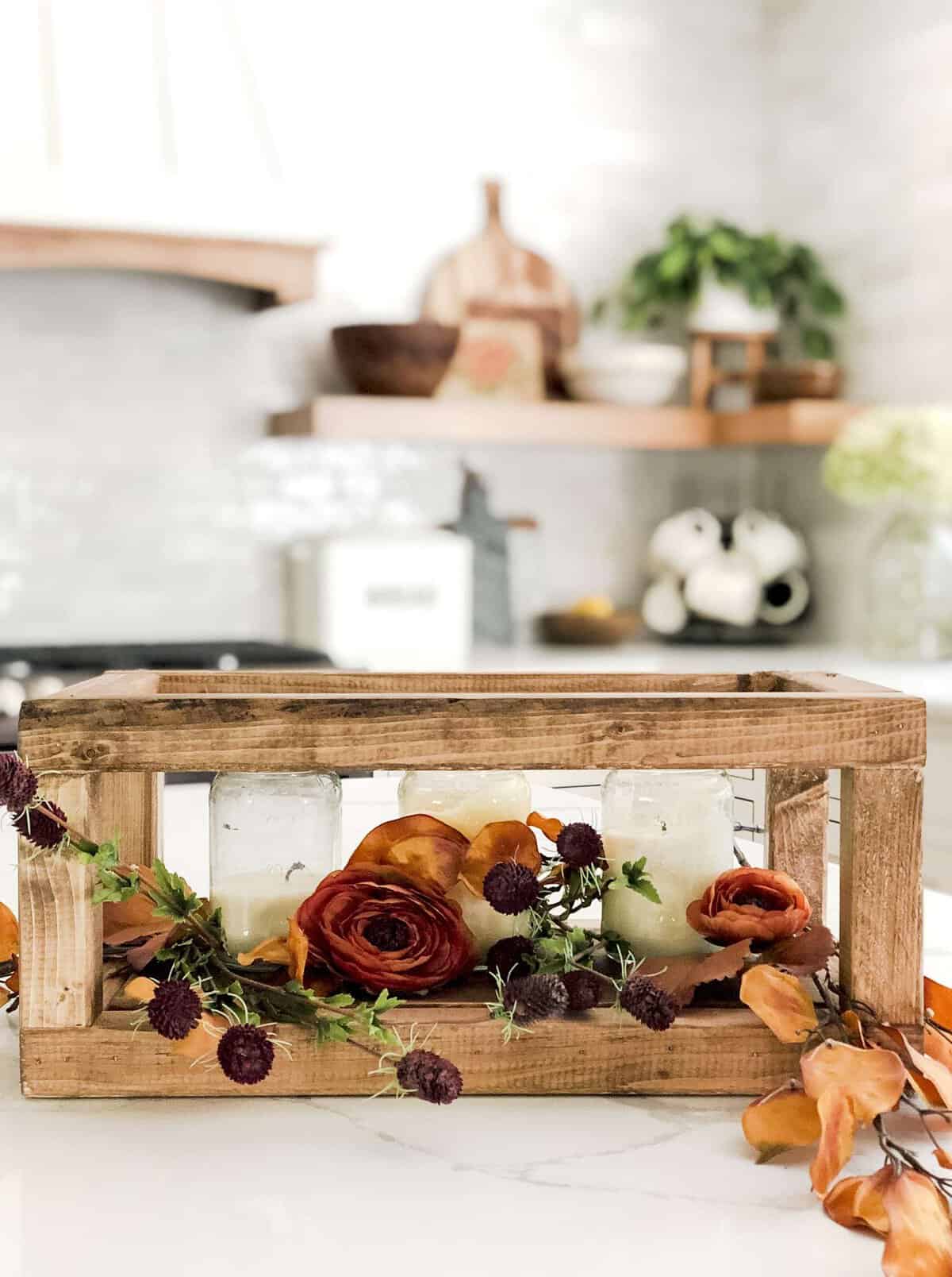 Small wood projects are a great way to decorate your home affordably! Use this tutorial, with video, to learn how to make a DIY wood centerpiece!