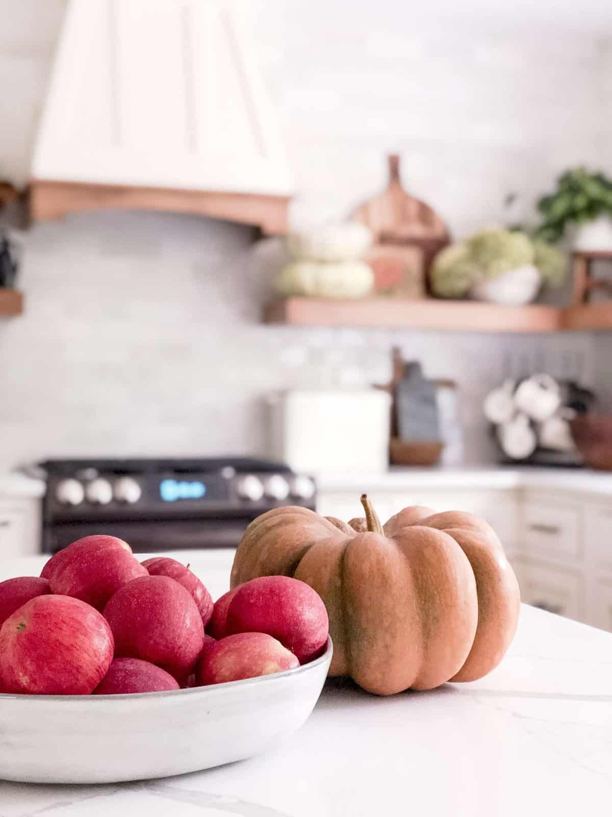 Apples and a pumpkin