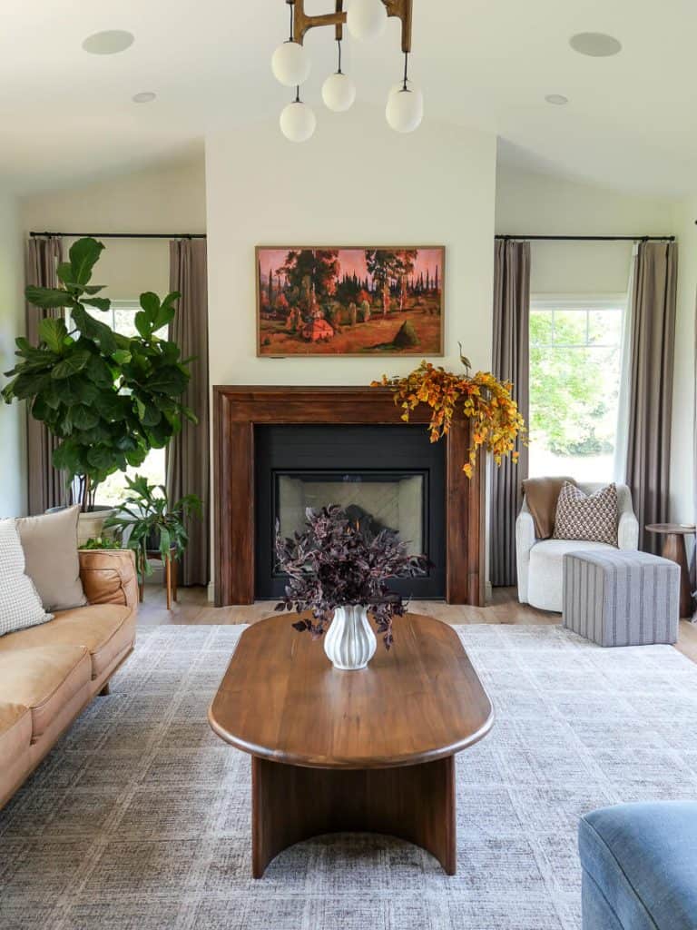 Fall mantel decor ideas with leaf stems.