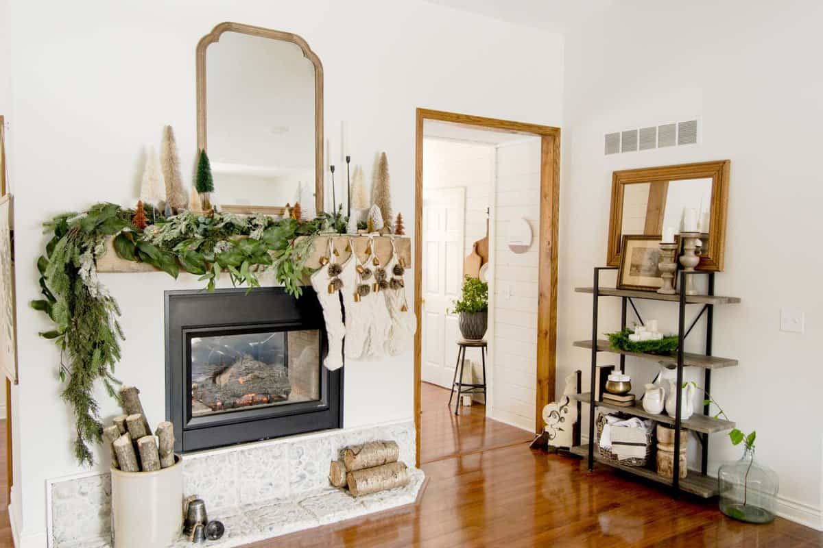 Christmas mantel decorated with garland.