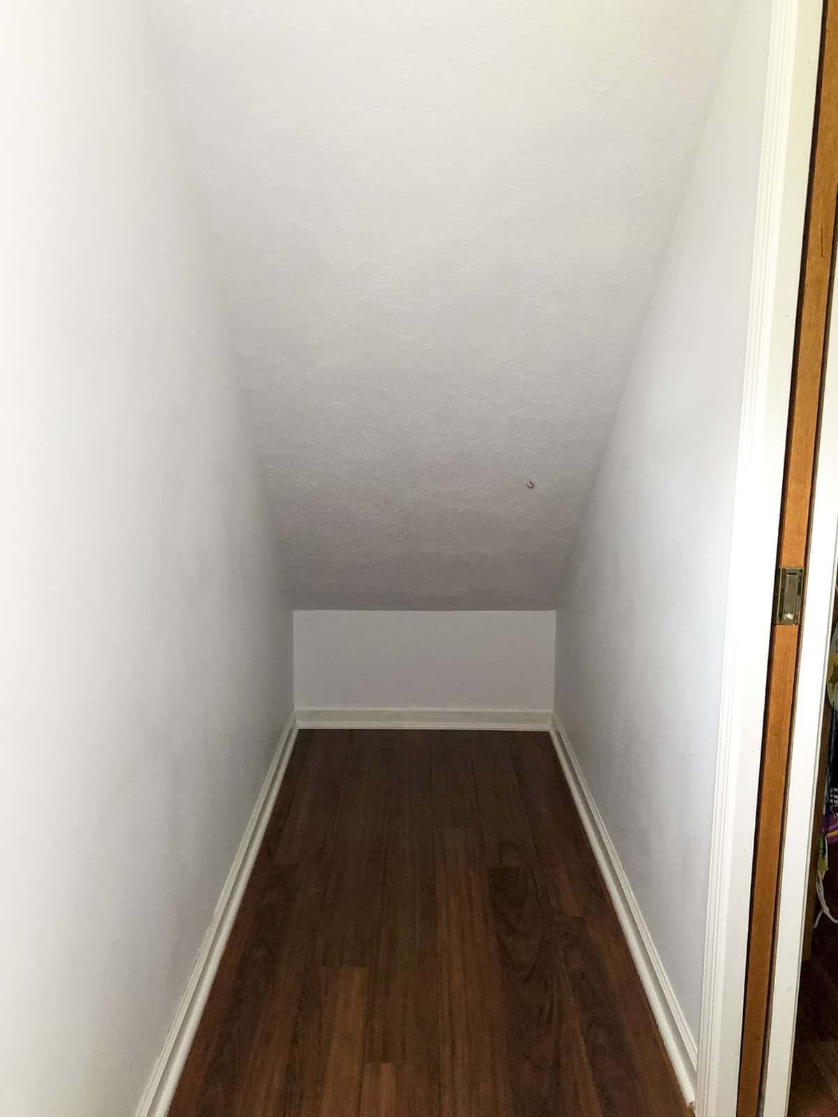 Under stair storage used as a playroom.