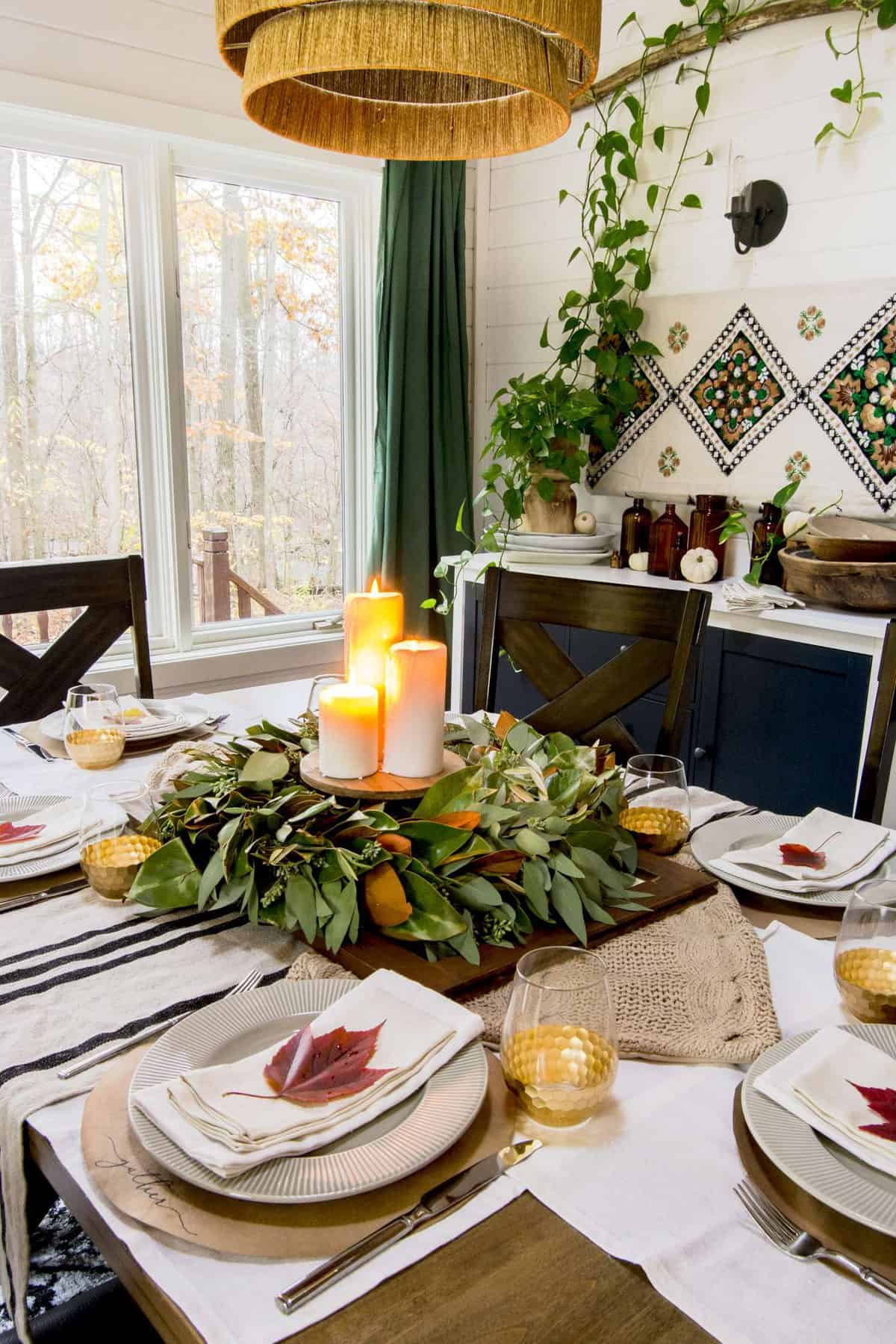 Fall table decor for Thanksgiving dinner.