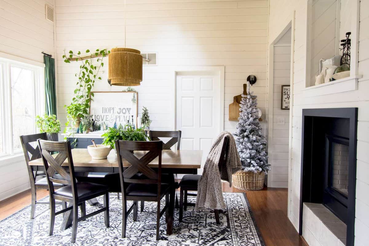 Modern farmhouse Christmas decorations in a dining room.