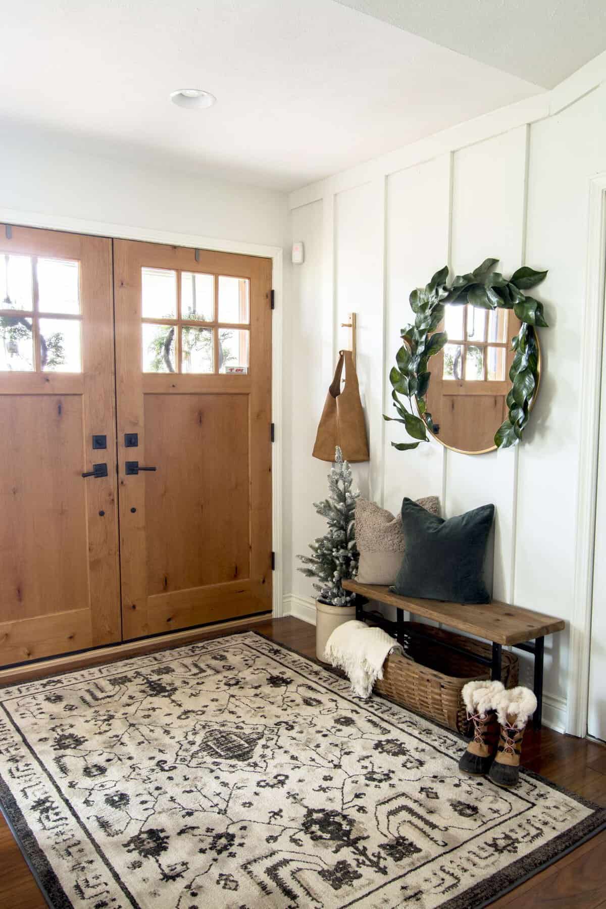 how to style a small foyer with a narrow entryway bench