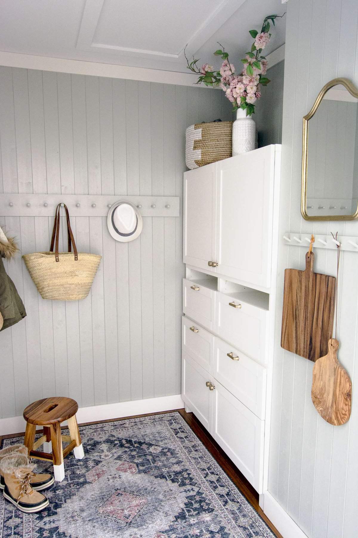 Do you need more mudroom storage but lack the space & budget? This mudroom built in hack added tons of storage and saved $2,000 instead of a custom cabinet!