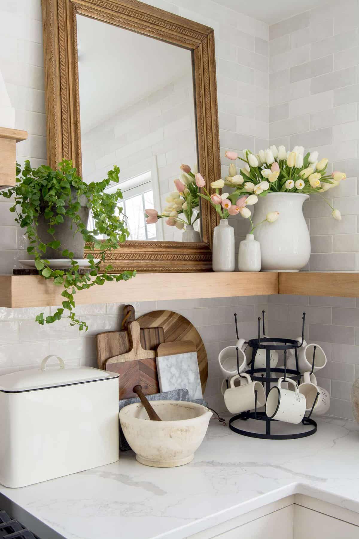 Kitchen open shelving decorated for spring.