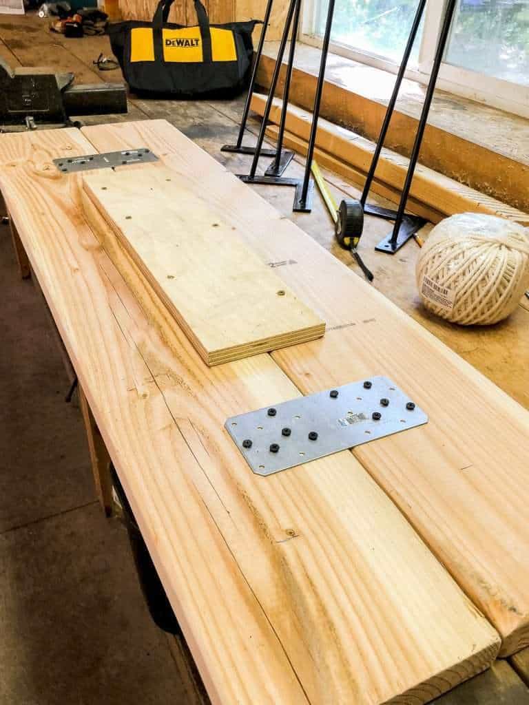 Tie two boards together for a DIY bench.