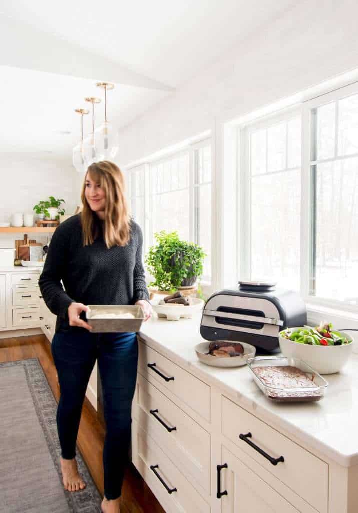 Chef in modern farmhouse kitchen.