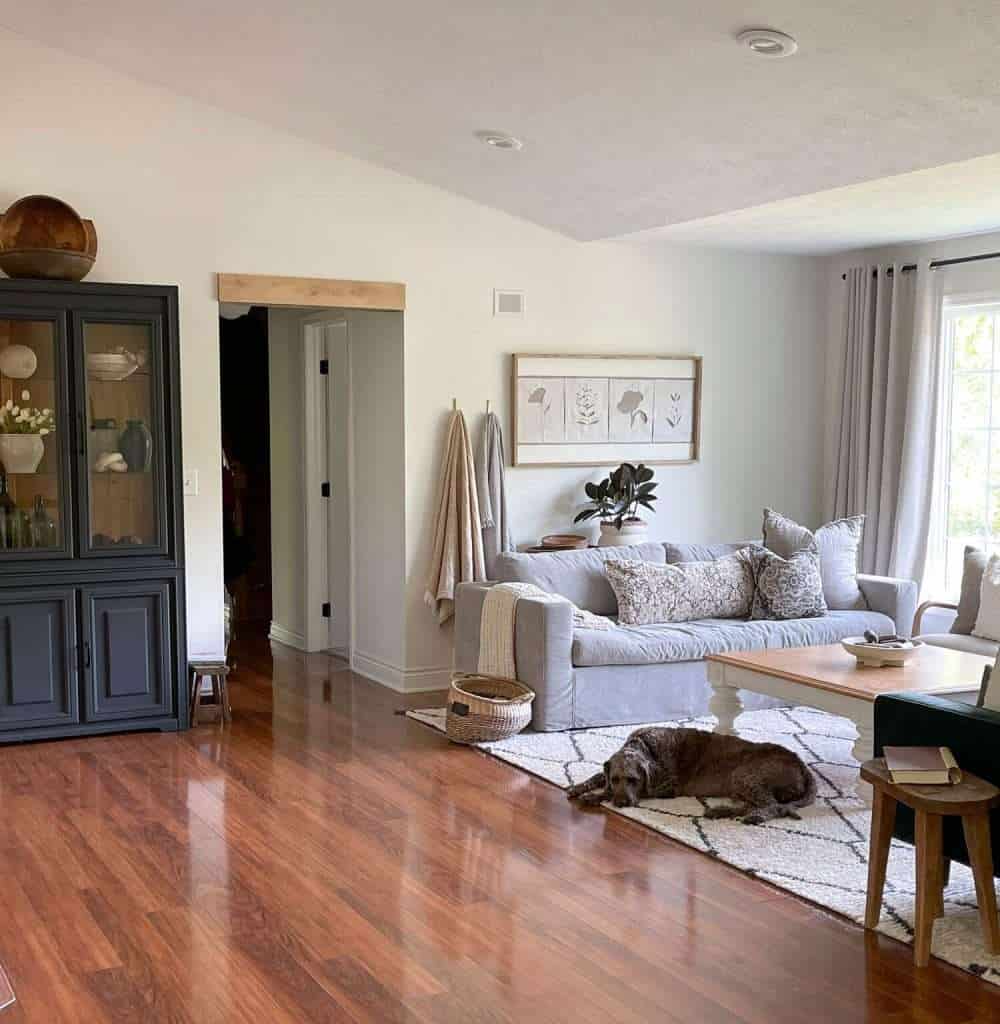 Organic modern living room cabinet with pottery.