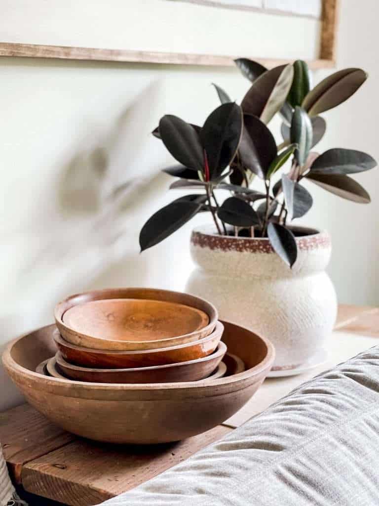 Vintage wood bowls in an organic modern living room.