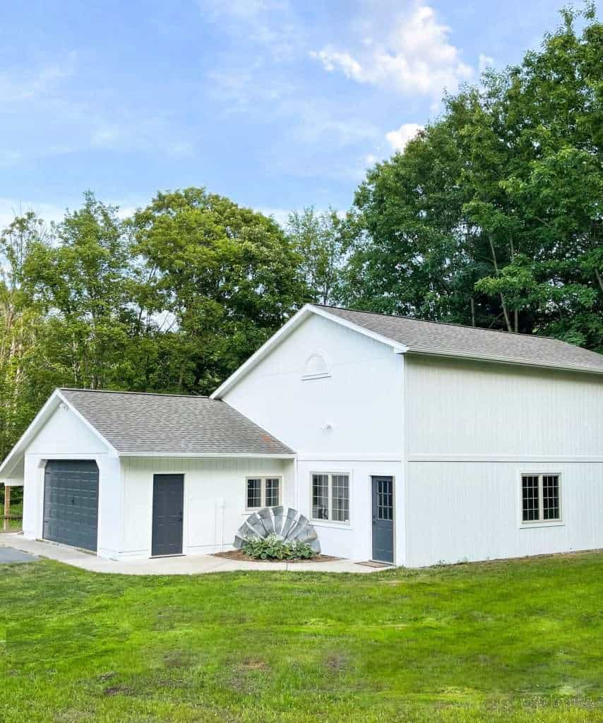 White barn with grey doors