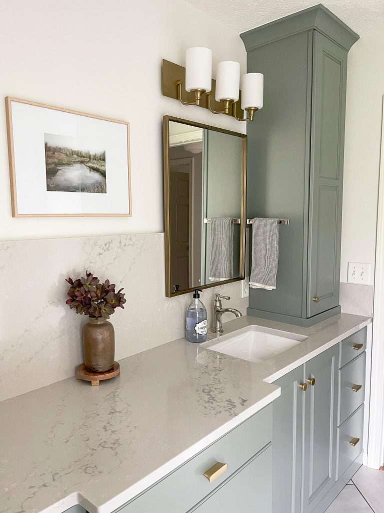 Quartz countertops in a bathroom.