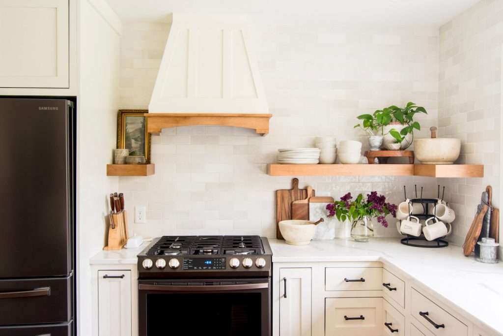 Kitchen styling on open shelves.