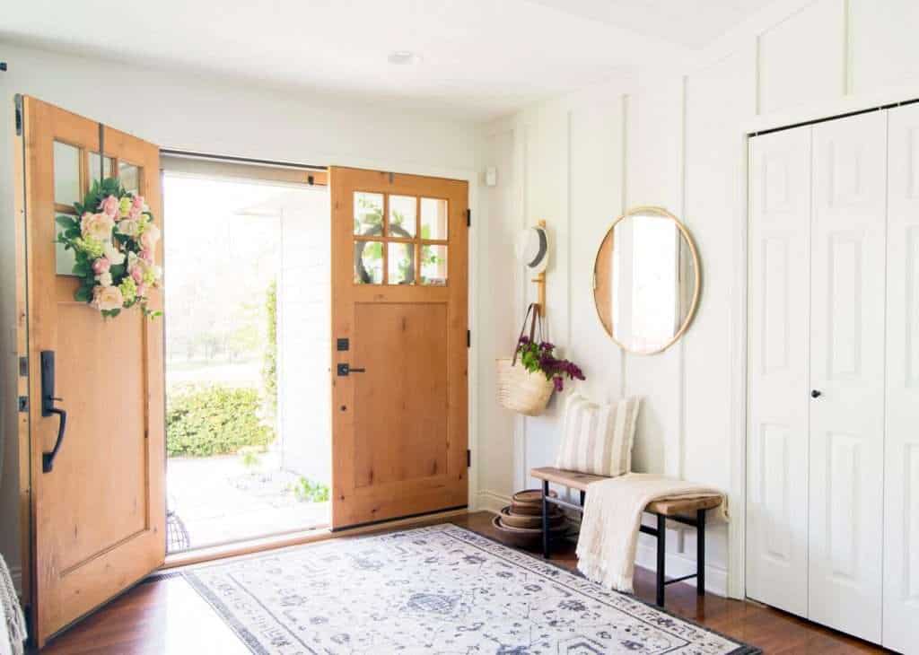 Board and batten entryway with double doors.