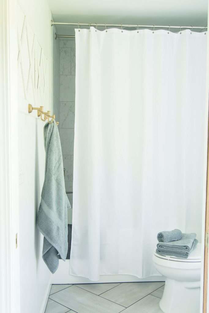 bathroom essentials list with towels