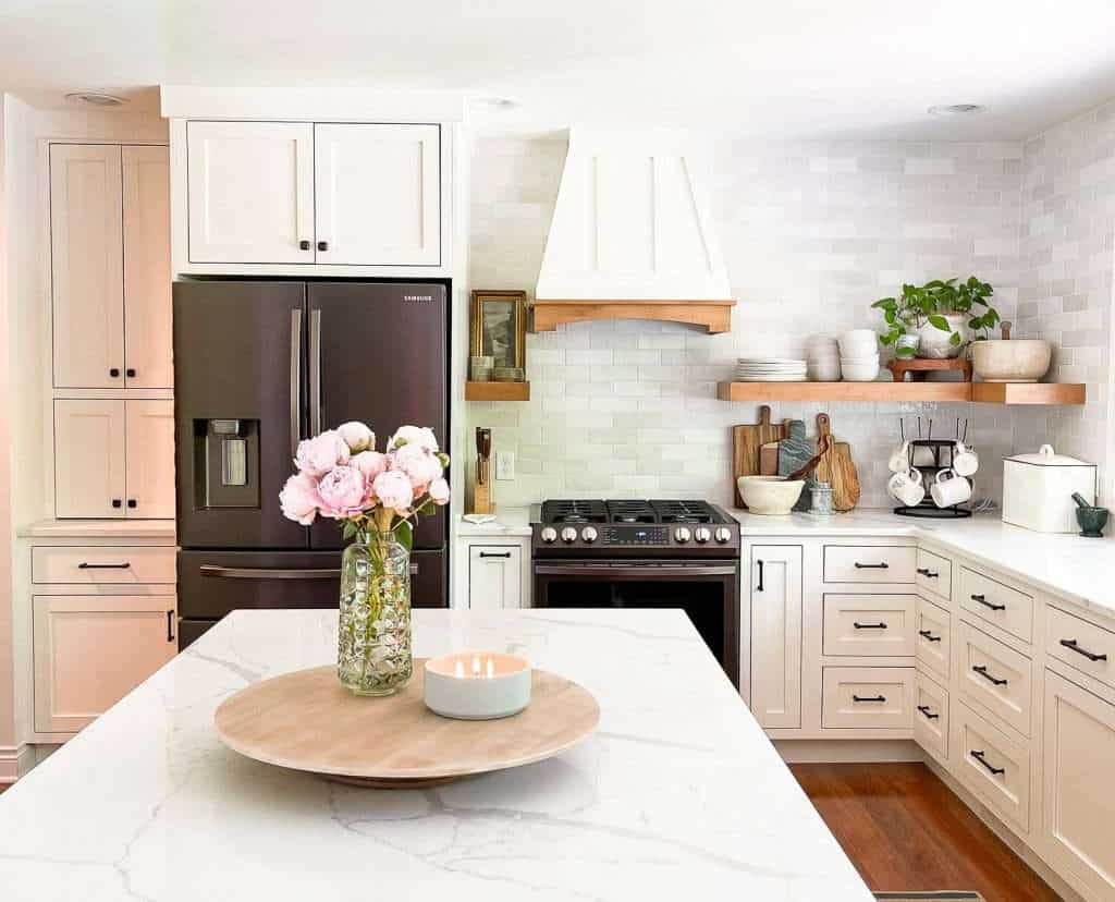 White kitchen with wood accents.