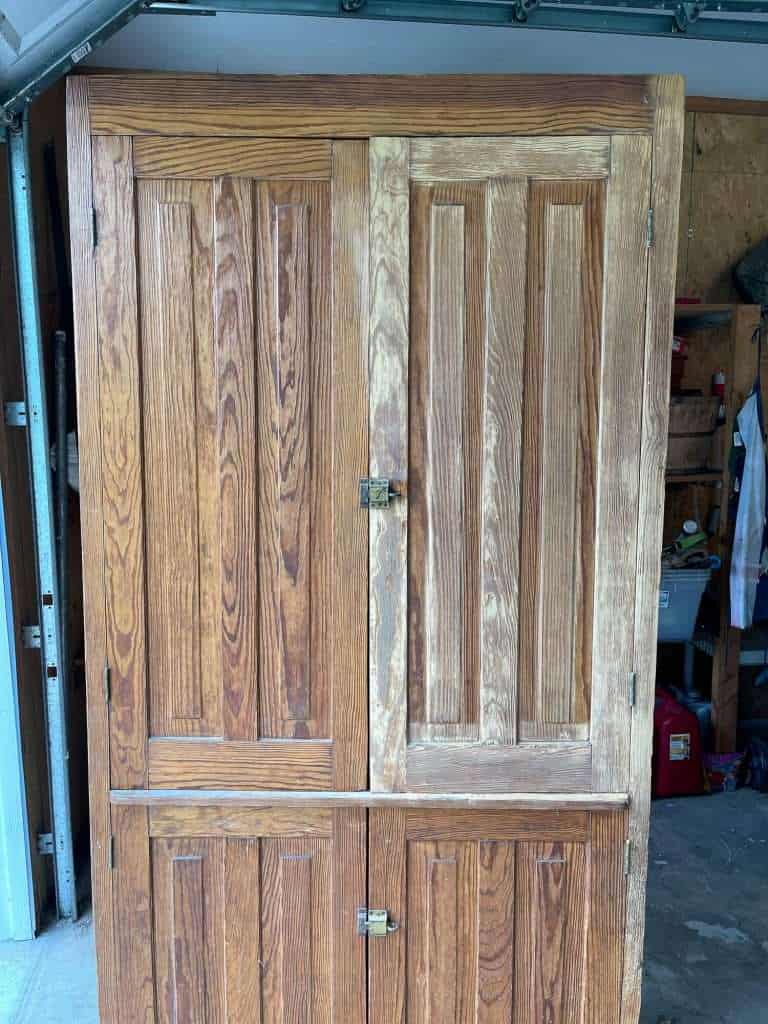 One door sanded on cabinet.