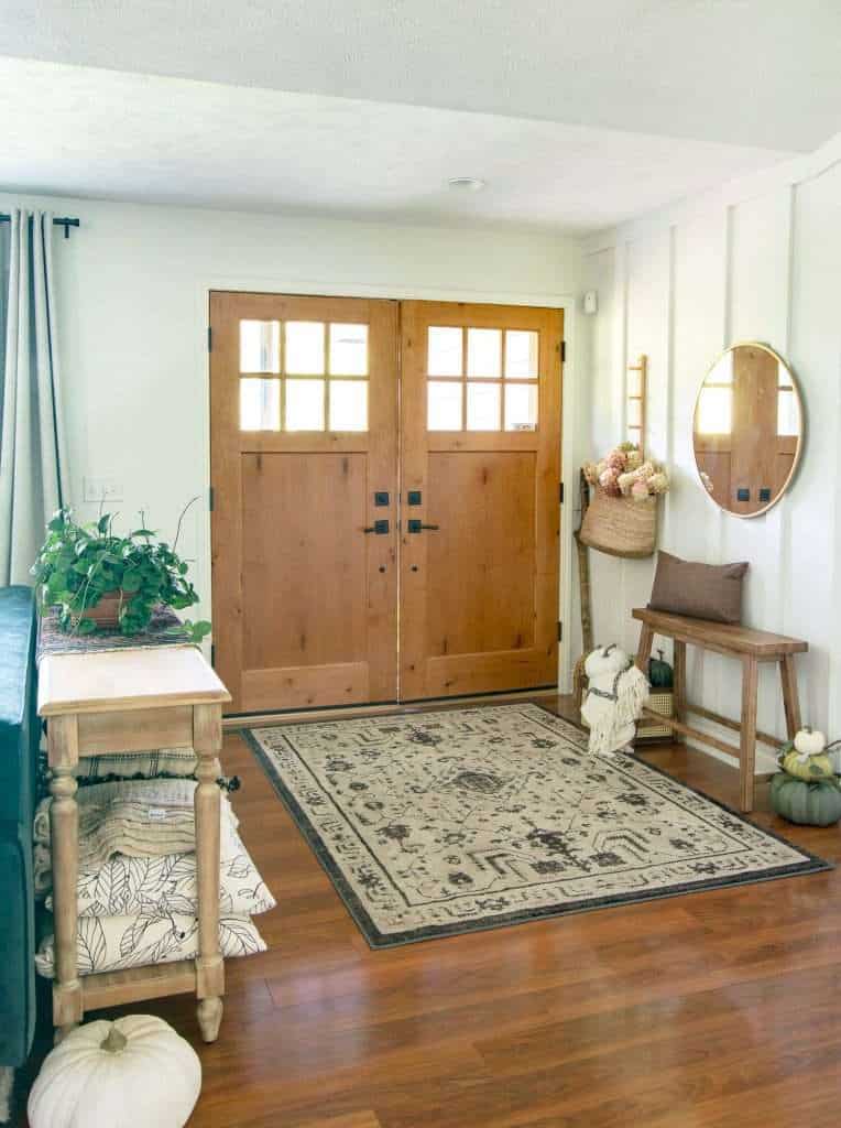 Fall entryway styled with rustic farmhouse decor.