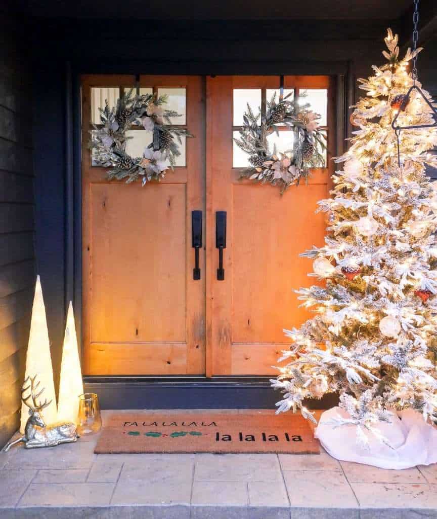 Christmas tree on a front porch.