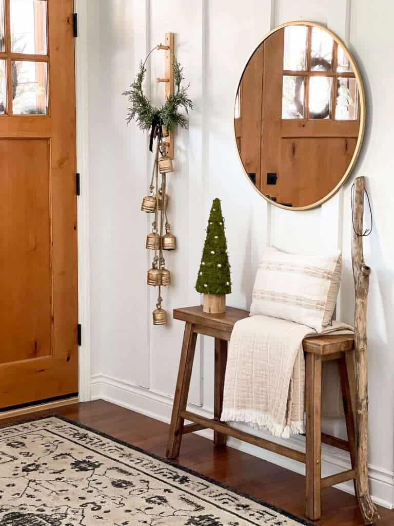 Front entry bench with Christmas decor.