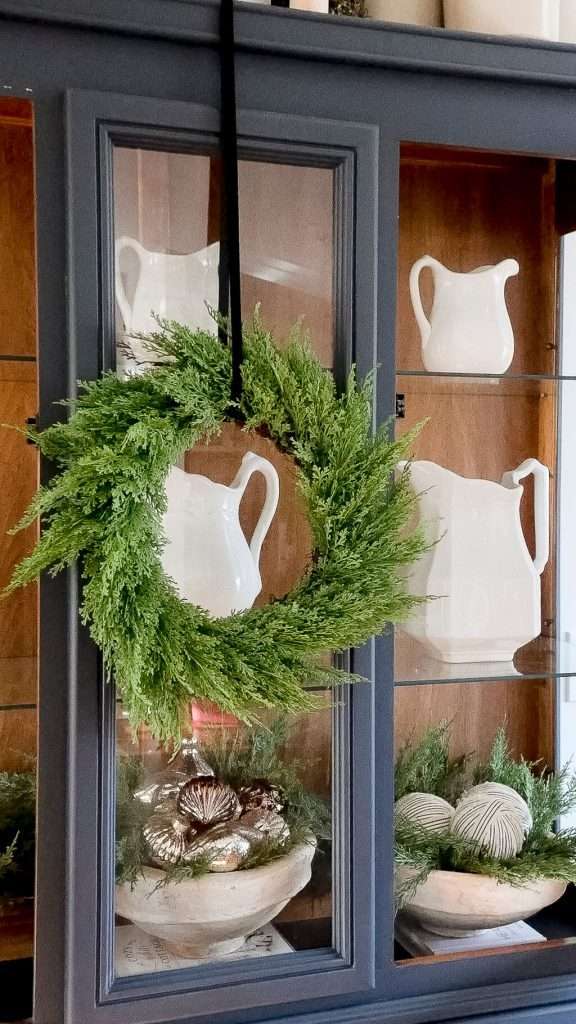 Evergreen cedar wreath as non Christmas winter decorations.