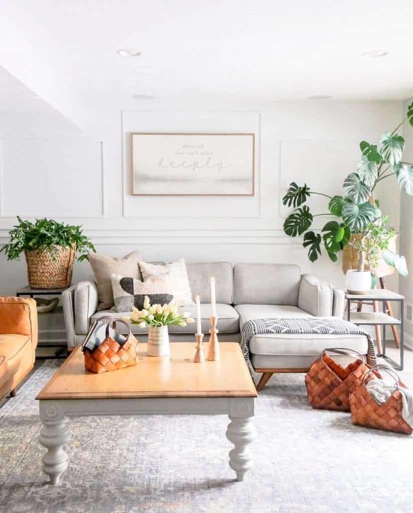 Coffee table with sofa and decor.